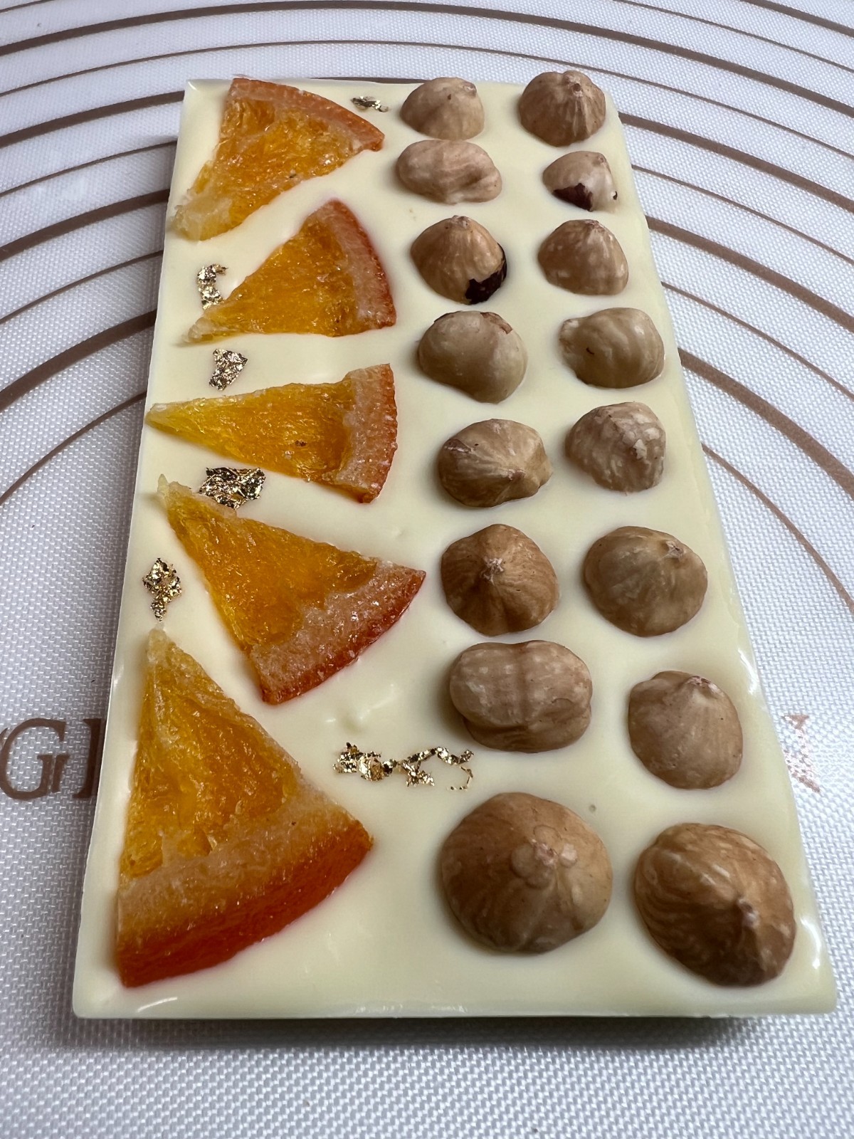 White Chocolate Bar fruit nuts Sweet taste topped Hazelnut Orange & Gold 100g .
