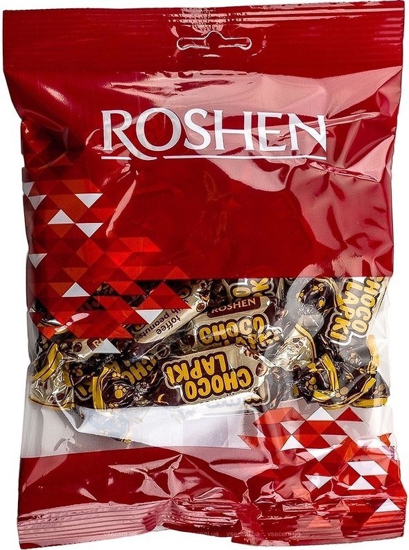 “Choco Lapki” candies with toffee filling, peanuts and chocolate glaze, caramel