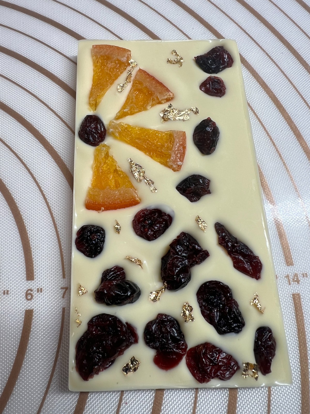 White Chocolate Bar fruit nuts Sweet taste topped Orange Cherrys & Gold 100g .