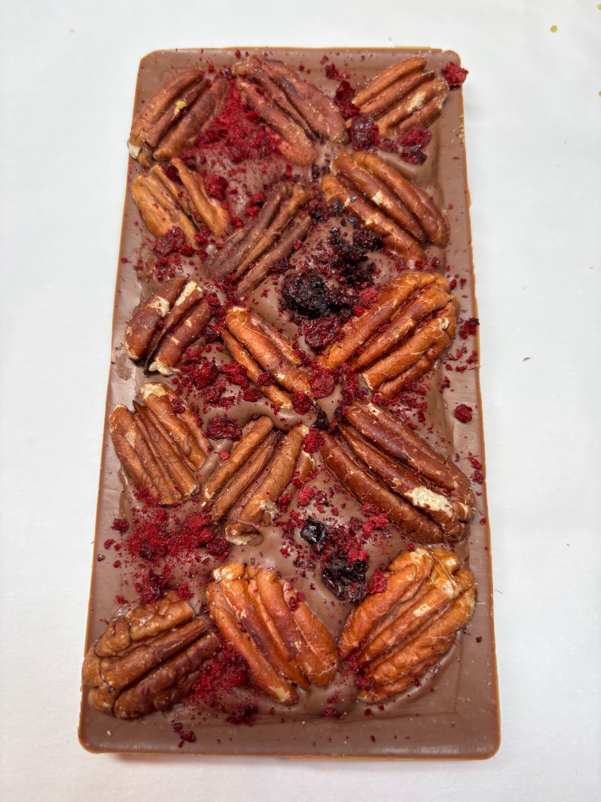Chocolate bar with Pecan Raspbery Cherry , milk hand crafted chocolate 100g .